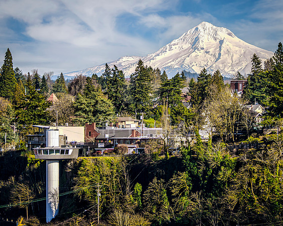 Oregon's mountain, Mount Hood, and Oregon City's unique landmark, its Municipal Elevator, lovingly called America's only vertical street.
