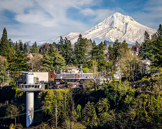 Oregon's mountain, Mount Hood, and Oregon City's unique landmark, its Municipal Elevator, lovingly called America's only vertical street.