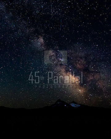 The Milky Way rises behind North and Middle Sister